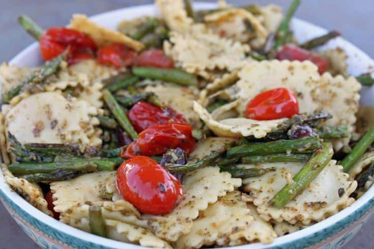 Pesto Ravioli With Asparagus And Grape Tomatoes