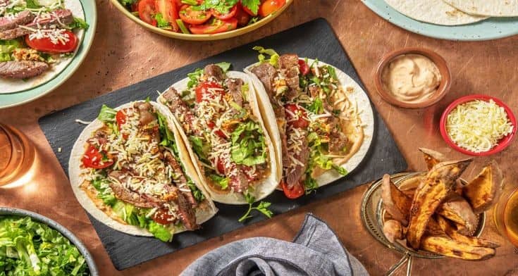 Chipotle Minute Steak Tacos And Chimichurri Tomato Salad With Cheddar Cheese And Sweet Potato Wedges