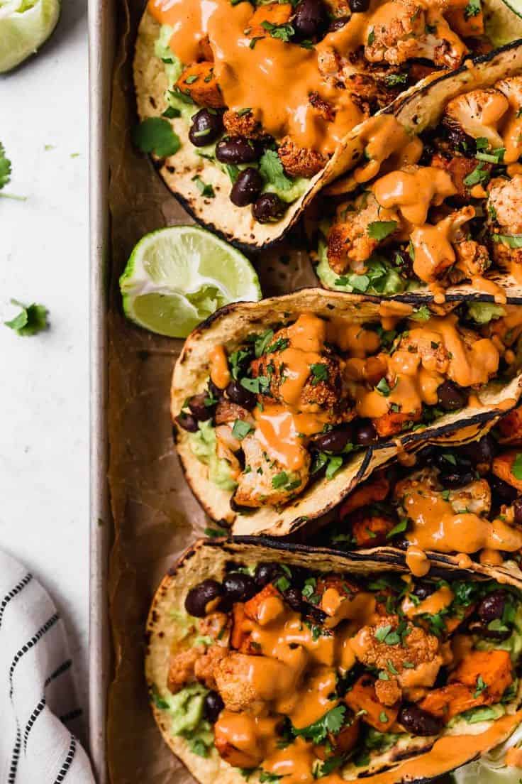 Roasted Sweet Potato & Cauliflower Tacos With Chipotle Cashew Crema