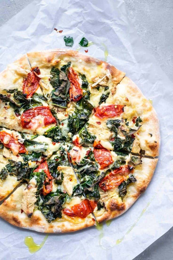 Crispy Kale, Roasted Tomato, and Vegan Chicken White Sauce Pizza