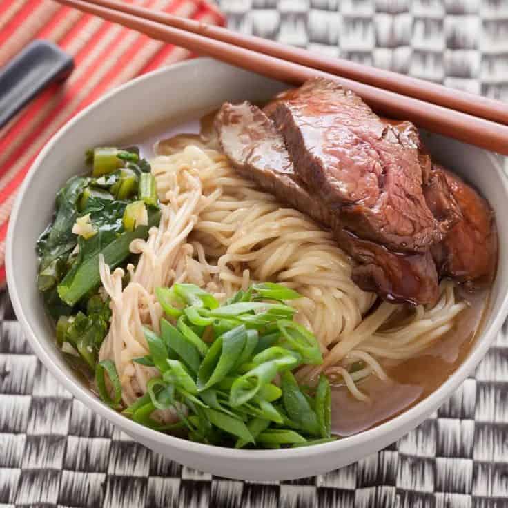 Beef Ramen Noodle Soup With Choy Sum And Enoki Mushrooms