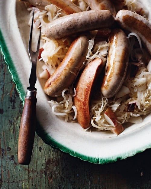 German Sausages With Apples, Sauerkraut, And Onion