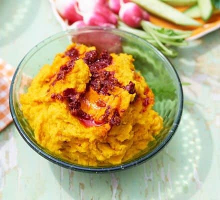 Carrot & cumin hummus with swirled harissa