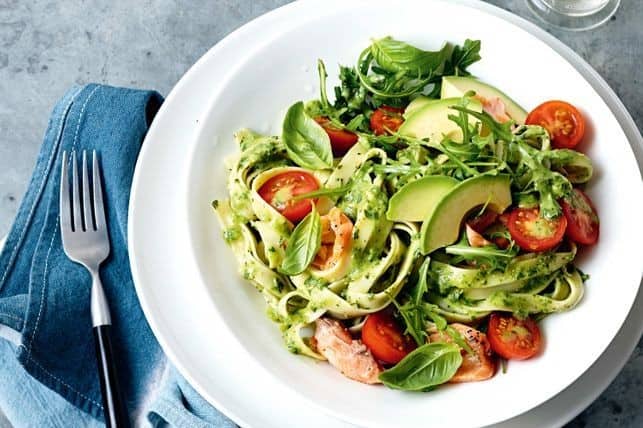 Avocado pesto pasta with hot-smoked salmon